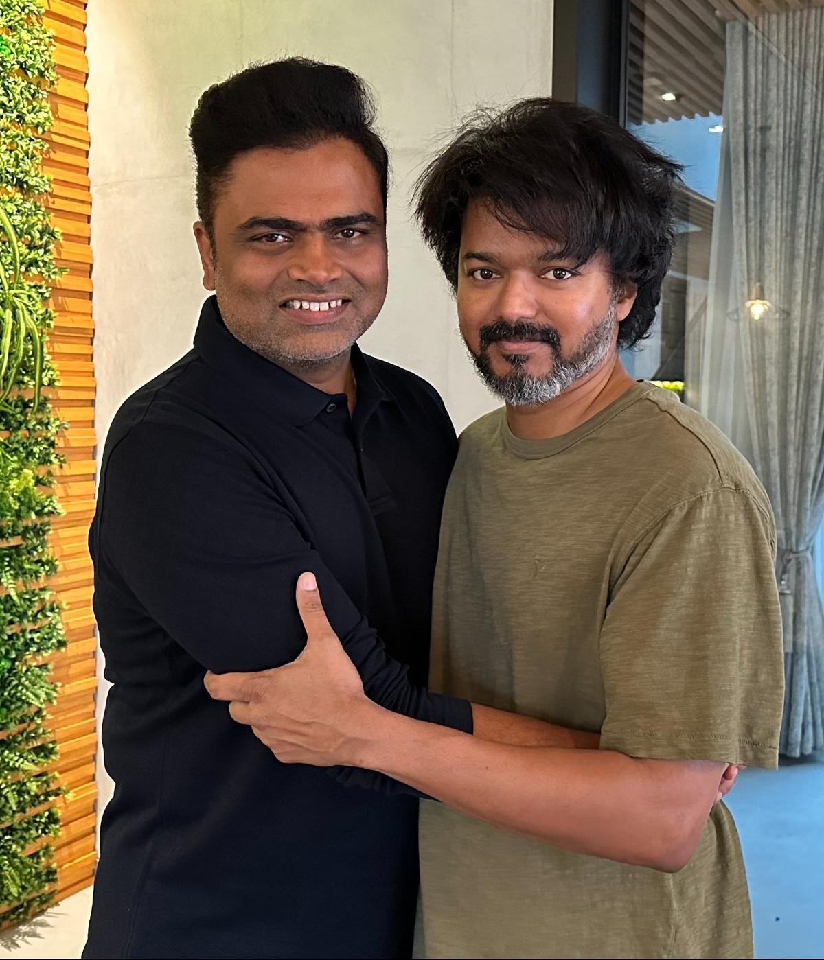 Director Vamshi Paidipally with Vijay